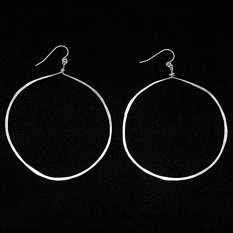 Ladies Cosmic Sign Earrings -Ladies Earrings for Photo Glow-Artisan Hammered Silver Hoop Earrings by Brin