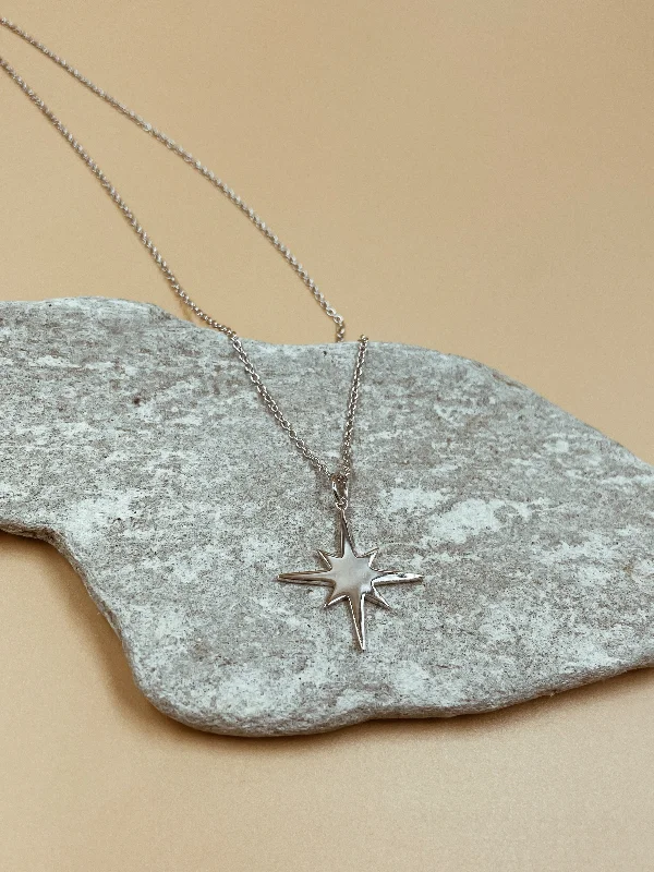 Ladies Necklaces with Bloom Shine-Ladies Shimmering Gem Necklaces -Medium Pointed Star Pendant Brass Necklace in Silver Tone